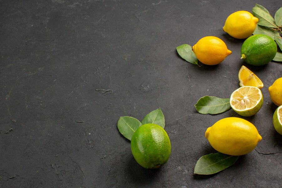 front-view-fresh-lemons-sour-fruits-on-dark-desk_140725-91700.jpg